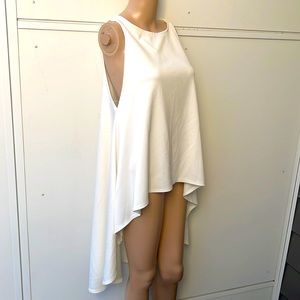 Off White Casual Asymmetrical Solid Sleeveless top size Large on the tag